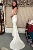 I am absolutely obsessed with this dress & cannot wait to wear it for my big day in August! It's very lightweight, stretchy in all the right places, and soft on the skin. The train & the whole dress is beautiful. Compliments my shape without showing too much. Perfect for my elopement! (I'm standing on a little stool to help show the train) - Alexis A.