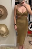 Was absolutely in love with the dress and style, but the color is nothing like the model photos. It's more of a green/brown and not flattering.. if it was the true sandy tan like the photos, it would be absolutely perfect. - Heather B.