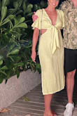 Ordered this for my honeymoon, and it ended up being one of my favorite outfits. It fits really well and compliments various skin tones - I wore this when I had a slight tan, but thought it looked good pre-trip when I was super pale. The fabric is linen and a little thicker so it lays nicely. I used pasties & fabric tape to get it to stay in place. - Heather B.