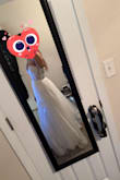 I love the dress, and I really liked it on me too. It definitely fits little smaller than I thought it would. I don't really want to exchange to M because I know it's going to be long and too big on me. It's tight but fits good. I did gain weight over last 6-8 months, about 10 lbs, lol so if I am to lose weight, it will fit better. Zips all the way still, but tight. I also wanted it tight because my chest isn't much there. One of the pads for the bra fell off. Was stitched in the corner pretty loose, and I knew it was going to fall off. I plan on adding straps to it because my bust will not let the dress stay put. It will definitely slide especially dancing time. Needs some adjustment and alteration but very cute dress! - Jae K.