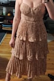 Top part fits weird on larger busts. Otherwise, fits a little loose. - Melanie S.