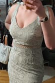 The fit was weird, was large on the bodice (and I have a very large bust), and small of my hips. Fabric didn't look as nice as in the photo. Cute in theory but just not quite it. - Melanie S.