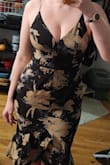Can't wait to wear this to my friend's wedding in France! It makes me wanna dance with the fun ruffle and fits my large bust great! Material is light, breathable, and slightly stretchy. It feels amazing on! - Melanie S.