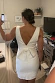 Very cute fits very well. Bust is a bit big but will fit a strapless bra and be perfect. Love the length, not too short but fingertip-length! - Evonne S.