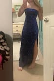 Absolutely stunning!! Looks a touch more purple in person, but it's super comfortable. The slit is not too high; it's about five inches above the knee. It passes the jump test and doesn't fall down when I jump. For this price, the quality is 100/10!! - Landrey W.