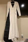 As someone eagerly anticipating their big day, finding the perfect wedding dress was paramount. Despite my initial reservations about purchasing online, this dress has completely won me over. It's not just a dress; it's a symbol of love, elegance, and the beginning of a beautiful journey. I cannot wait to walk down the aisle in this exquisite gown and make unforgettable memories. I did encounter one minor issue, it runs a little big. However, even with this small hiccup, the overall quality and beauty of the dress far outweighed any concerns. With a few alterations, it fit like a dream and accentuated all the right curves. Thank you for your attention to detail and for creating such a masterpiece that will be cherished forever. - Mandy K.