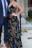 I wore this to a fall wedding and have genuinely never received more compliments on a dress! I love the fit, and the slit up the leg didn't come up too high. It's a tiny bit tight on the chest (in a good way), so I didn't feel like I needed to wear a bra with it. It was really long for me (even when wearing 4 inch heels), so I did have to take it in for alteration, but that's pretty normal for me. The underside of the lower tiers are made with a lighter fabric, so the dress doesn't feel too hot. And if you know what you're doing, it would probably make alterations for length pretty easy. Would 100000% recommend it. - Samantha R.
