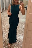 The dress was a little difficult to put on and get off due to not having a zipper on the side or back but it was a perfect fit on! Super comfy. - Heidi B.