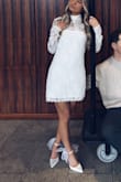 This dress was the exact vibe I was going for! I will say the strapless part on the inside was a little big but I'm typically an XXS so I just used fashion tape to keep it from falling down. The back is so pretty too. It was a little short so I couldn't raise my arms but I still love it. - Lauren U.