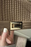 Bag was perfect for vacation and trendy, but the clasp did start showing wear and scratches after one week of use. - Bridgette O.