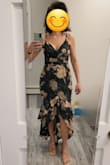 Love the dress. It ran big in the hips and chest. I got a medium, but a small would have been too tight. I think they size dresses small for 2-4 and medium for 6-8. I wish a medium was a 4-6. I seem to fall in between their 2 sizes. Otherwise, it's a really pretty dress and well-made with lots of style. - Laura D.