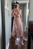 This set is so adorable. The gap between the skirt and top is perfect. The quality is top notch. The frilly skirt is great for a beach vacation but also a wedding or other event. The colour in the photo looks more red, and it's a true rust brown (it says it's rust brown in the description) - Amanda D.
