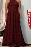 I don't usually like to make big clothing purchases online, but I was pleasantly surprised by the quality of the dress. The fabric really is nice and seems durable. It flows nicely and doesn't seem to wrinkle easily. I will need to get it hemmed since I'm not very tall, but that's not a big problem and I expected it. All in all, I'm happy with the dress and can't wait for prom. - Ella C.