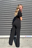 I ordered this for a high end hair show in Chicago. The top was too tight and I'm small busted, but the pants were perfect! I ended up pairing it with a bodysuit I also got from Lulus. Love the length and fit! - Stephanie E.