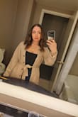 So I initially bought this to be a dress, but it was a little big. I'm usually between a large and XL, 12/14 in pants. It fit, just made me look a little bigger. So I decided to wear it open like a cardigan, and I loved it! Great quality. Thick and warm but not overly hot. I will try to shrink it a little and wear it as a dress as well. - Rebecca D.