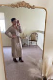 I wore this dress to a baby shower. I got so many compliments. The dress is very comfortable and I felt great in it. It does run big but I don't mind that baggy look. I see myself wearing it more often for work. - Viviana G.