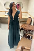 The dress is great! The color is a bit darker than the one in the photo but the fabric is great. The price was excellent and the shipping arrived in a very reasonable amount of time (5 days) I used double sided tape to keep it in place and it worked perfectly! - Erika S.