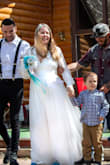 I can't say enough about how much I loved this dress. The fit, the feel, and the look just amazed me. Wore this for our 25th anniversary vow renewal. If you're not sure, just do it!  You won't regret it! - Leasetta F.
