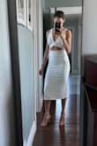 This dress is amazing. Fits just as it's shown on the model. The cutouts are all placed perfectly. The material is high quality and soft. - Amanda D.