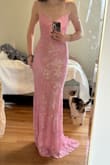 This dress took my breath away when I put it on. It's so stunning irl. It was a little loose at first but the lace up in the back makes it totally adjustable! It's pretty long. though. I was walking all over it. - Lauren R.