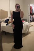 I'm usually between a medium and a large and ended up ordering both. the large was a little too big around the neck line and had a bit of extra fabric and the medium was perfect. It may be on the shorter side for taller girls. I feel like I won't have to get much taken off. - Payton C.