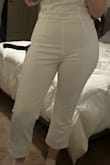 If you're tall, this is not for you. I ordered a L and XL, and neither of them was the same length as the display image. The pant leg hit me mid-shin. The material is see through. The jumpsuit fit me perfectly (besides length), but the material stretches and makes it look like it's pulling in the hip area. - Alyssa S.