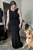 This dress fit amazing; it was super soft and stretchy. I went with an XL just to be safe, and it wasn't too small and wasn't too loose either. Very breathable, and I'm able to move comfortably in the dress. Would definitely purchase again for another occasion. - Faith D.