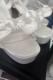 I love the design of the shoes, along with the color! I'm not very happy about there being a few stains on my newly white heels! I received them in the mail like this. I would understand if they were used, but Lulus should not be sending stained heels to new customers! - Sophie C.