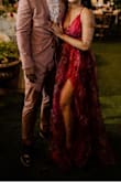 It is a little puffy on arrival. Must steam and flatten for a flatter look. Overall, gorgeous dress. Everyone loved it, so many compliments. Leg slit was the cherry on top. - Indiria H.