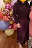 If you're tall, it's perfect. If you're a little shorter you might need to get it hemmed but still buy it! I had to get it shortened and the outfit ended up looking good. Loved it! Great quality too. I bought two. - Elsa G.
