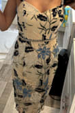 This dress is beautiful on! Thought it was really pretty when I saw it online, but when I pulled it out of the package I wasn't sure about it. Once I got it on it was a completely different story! So pretty!! Unfortunately, it's a little big. Ordered 2 other dresses in XS and both fit, but this XS did not. I'd like to size down but it's out of stock! :( Hoping it comes back in stock before my event! - Grace B.