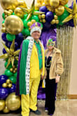 I wore this jumpsuit to a Mardi Gras Banquet; it was super comfy and very pretty. It was a tad too long on me, but I wore heels and that helped a little. Not the best pic of the outfit since I had a coat on. - Sylvia D.