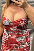 The dress is very cute and stunning on. However, the boning at the top has an odd placement. For my size bust it literally cuts my bust in 1/2 and you can see some of my bust BELOW the boning. Looks very strange. Due to the print, I could almost get away with it but it's VERY noticeable, especially on one side, and a bummer. :( - Sherry K.