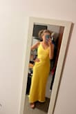 This dress is beautiful. I followed the recommendation of sizes on the page and it fits but it's a little tight on my upper body. - Monica M.