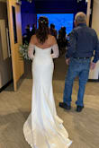 I'm 52 years old, and this was my second wedding. We didn't want to spend a lot of money, but I wanted to look like a bride. I tried several other dresses, but this was my favorite. I had the front of the dress hemmed. Other than that, the small was the right size. - Shari H.