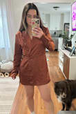 So this is cute and I'm going to wear it for a night out for sure. It's just a little loose in the waist area. It fits my shoulders and back perfectly, but the waist is just loose. Will wear it with a belt and high boots and will look super cute. Also weird.. the arms are sooooo long lol. But it's fine - Sara G.