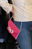 This bag was such a great buy! It's slim but surprisingly held a lot. I was able to fit a card wallet, pepper spray, lip gloss, chapstick, and sunglasses comfortably. It didn't snag on any of my clothes and stayed snapped the entire time. - Kara S.