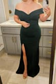 This dress is absolutely amazing. The color is a deep green and the fabric has just enough stretch to hug the body without feeling too tight. It's so flattering and comfortable. Love love love. - Jana B.