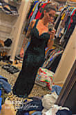 This dress is absolutely beautiful! I love the emerald green color and the sequin detail! The sequins were not itchy or uncomfortable at any time. The dress fits like a glove, a little long but perfect length with heels. I love the back detail, which I unfortunately didn't get a picture of! - Danielle R.