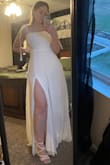 The fit is very nice! I am normally a small top and a medium bottom, and the small fit great! The dress is slightly long even with 4in heels; it touches the ground. - Katlyn P.