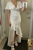 I ordered the white version of this dress for my bridal shower. I am 5'4 and 120 lbs and ordered a S. The top around the chest and shoulders was a little big, but I got alterations done to fix it. The material is great. I would recommend this dress in any color! - Madison G.