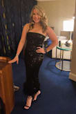 You will get compliments all night in this! I wore it to my company Christmas party. It was the perfect blend of classy and sexy. Definitely lay flat to dry with the feathers. - Becky K.