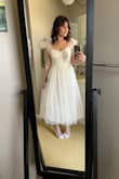 It fit true to size. The sleeves were a little awkward, it was slightly too long, and the bust was sewn slightly uneven, and wasn't the most comfortable dress. Still cute but not for me. - Leah A.