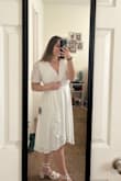 I love how the dress not only fits true to size, but it is also adjustable using the tie. It's a perfect length as well!! I also got the shoes in the picture from Lulus and I LOVE them!! - Caroline W.