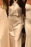 Was very flattering and fit very well but would size up. I am 5'3 and it was pretty long. - Clare R.