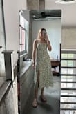 I loved the dress. It runs a little big; I ordered an XS. If they had an XXS, I would have ordered it, but it's still cute and perfect for the summer. - Nicole M.