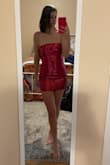 I'm tall and skinny with a normal bust size, and it fits okay. Little short and a little loose around the bust area but still okay. Material is great! Shine is perfect. - Rachel H.