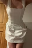Super cute dress! The pearl detailing looks beautiful and not cheap. The material is comparable to the ones found on Revolve and comfortable for 1/2 the price! I ordered this for my June Bridal Shower, but I'm returning it because the straps were too loose and it's not worth it to try and alter. I wish the straps fit better because I would 100% be wearing this! Awkward photos but looked way better in person. Buy this! I bought a size small. I am 121lbs, 34B chest and 27 waist. An XS would have fit my shoulders better but would've been too tight on my waist area. The length is perfect. Beautiful dress and great quality!!! - Kelley G.