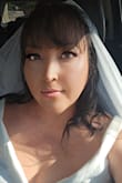 A nice and simple veil. I wore it with my hair down and put a tiny ponytail so the comb could have a strong grip on it. - Michele D.
