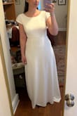 Absolutely love it! The dress is just as pictured. It's the only one I bought, I love it so much I won't be trying on any more! The material is thick and looks expensive. Timeless dress. - Sofia H.